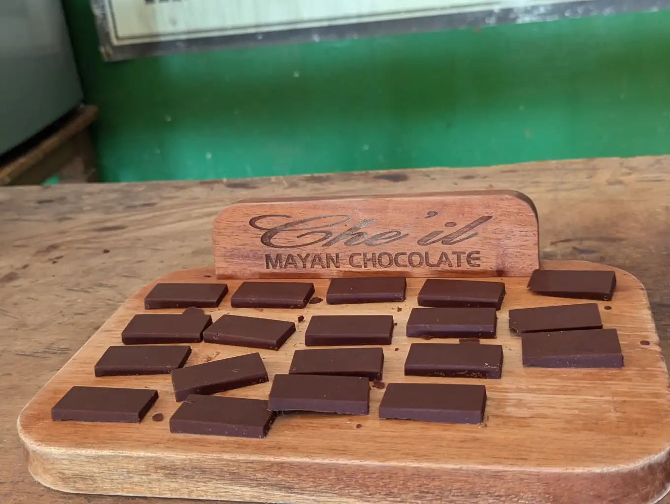 Squares of handmade Maya chocolate on a Che'il Mayan Chocolate board, Belize