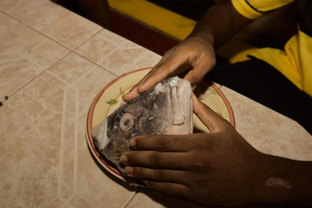 Hands working over a bowl in the cultural kitchen at Palmento Grove