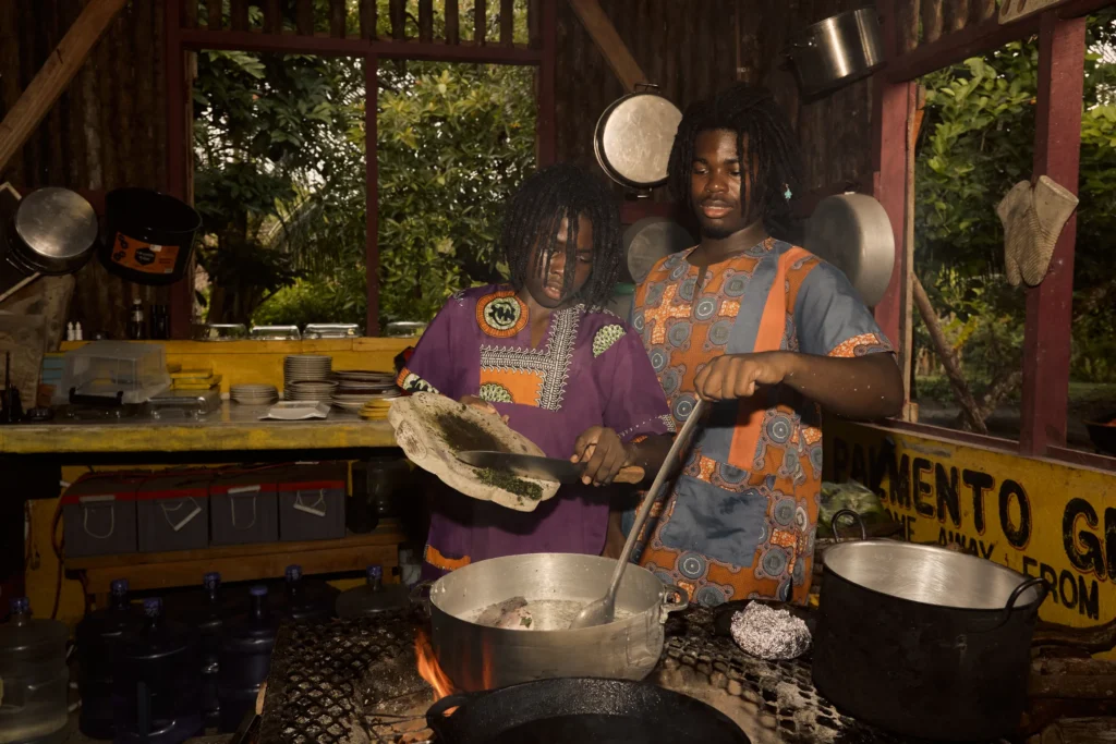 Pots over the open fire in the cultural kitchen at Palmento Grove