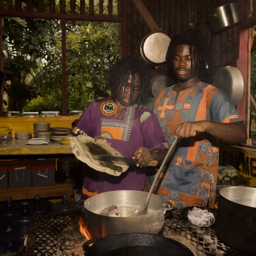 Pots over the open fire in the cultural kitchen at Palmento Grove
