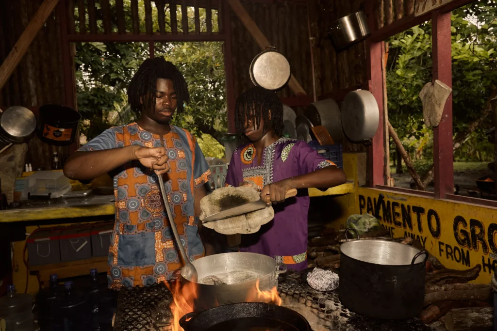 Cooking over open fire at Palmento Grove, Kalipuna Island