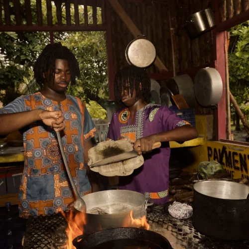 Cooking over open fire at Palmento Grove, Kalipuna Island