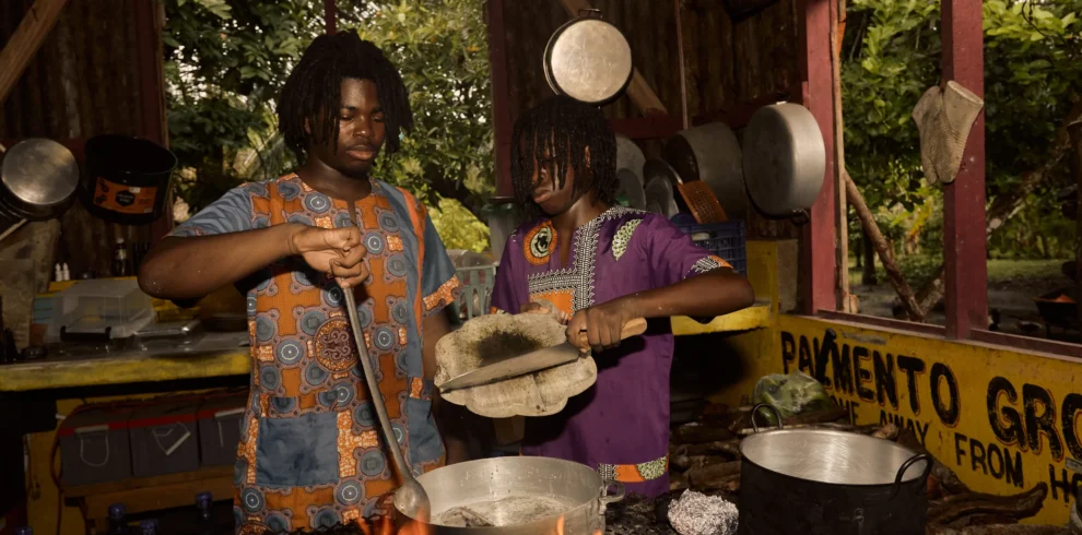 Cooking over open fire at Palmento Grove, Kalipuna Island