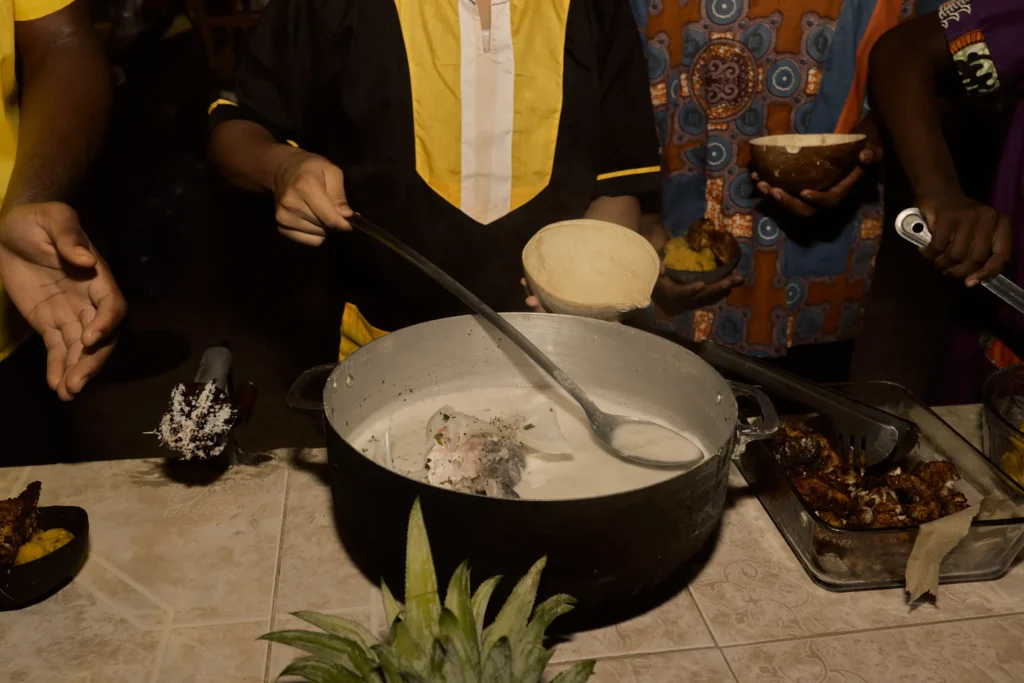 Cooking over open flames in the cultural kitchen at Palmento Grove