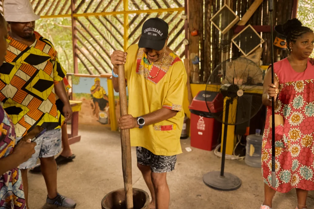 A cooking class around the open fire pots at Palmento Grove