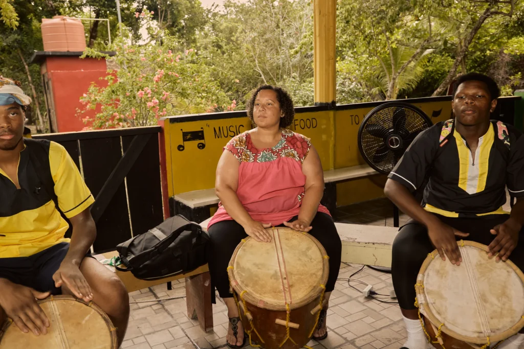 A Garifuna drumming circle at Palmento Grove, Hopkins, Belize