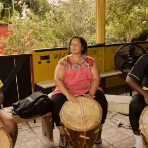 A Garifuna drumming circle at Palmento Grove, Hopkins, Belize