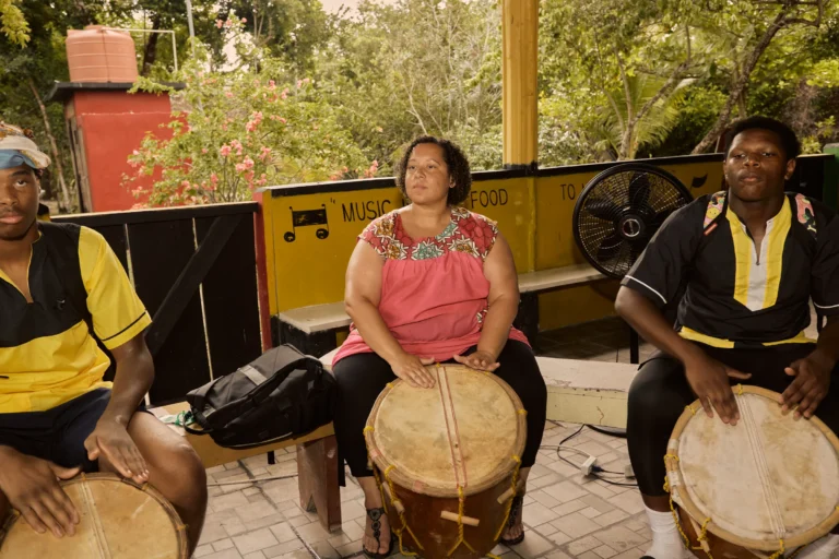 A Garifuna drumming circle at Palmento Grove, Hopkins, Belize