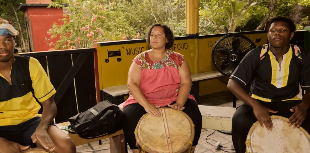 A Garifuna drumming circle at Palmento Grove, Hopkins, Belize