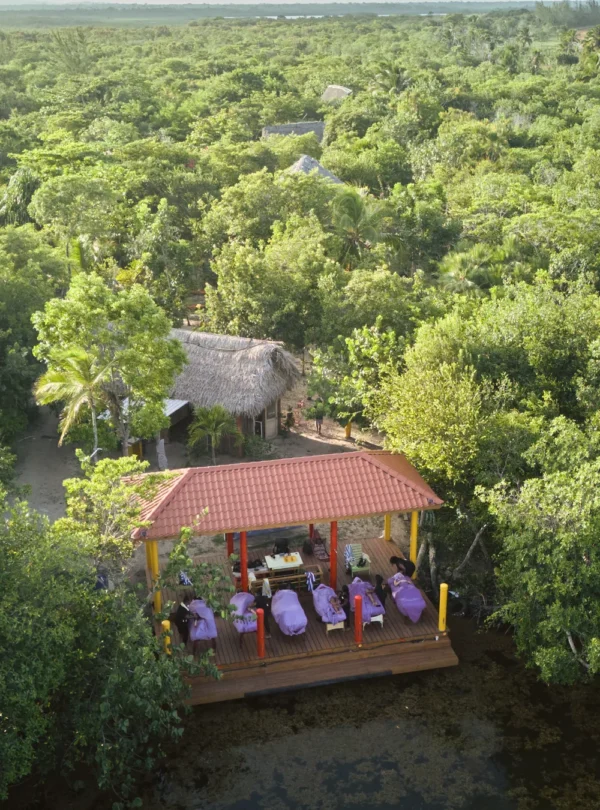 Aerial view of the massage deck over the mangrove lagoon at Palmento Grove, Hopkins, Belize