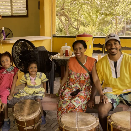 Guests and shared meals at Palmento Grove, Hopkins, Belize