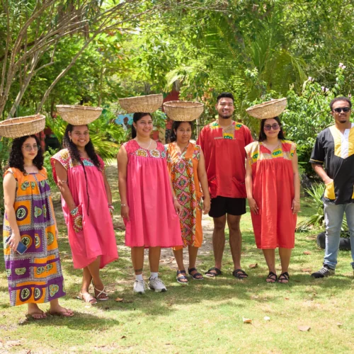 Guests and shared meals at Palmento Grove, Hopkins, Belize
