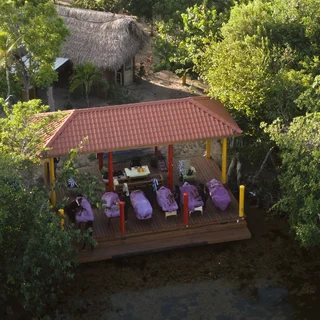The lodge from the air, in the mangroves on the lagoon