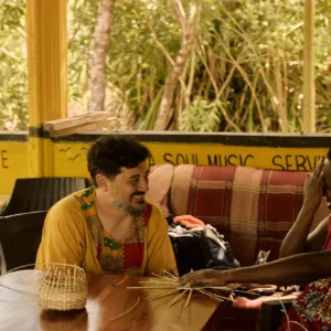 Close work on a hand-woven basket at Palmento Grove, Hopkins, Belize