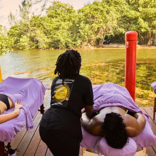 A massage on the wooden deck over the mangrove lagoon at Palmento Grove, Hopkins, Belize