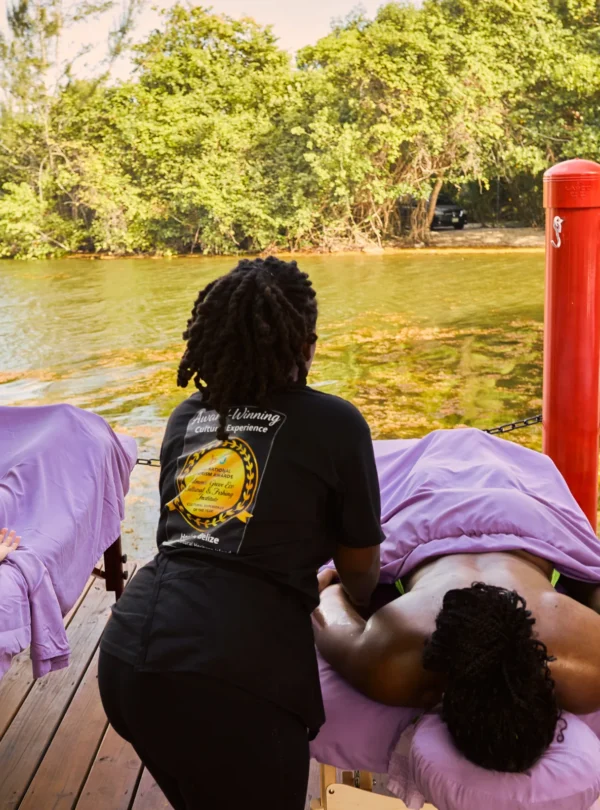 A massage on the wooden deck over the mangrove lagoon at Palmento Grove, Hopkins, Belize